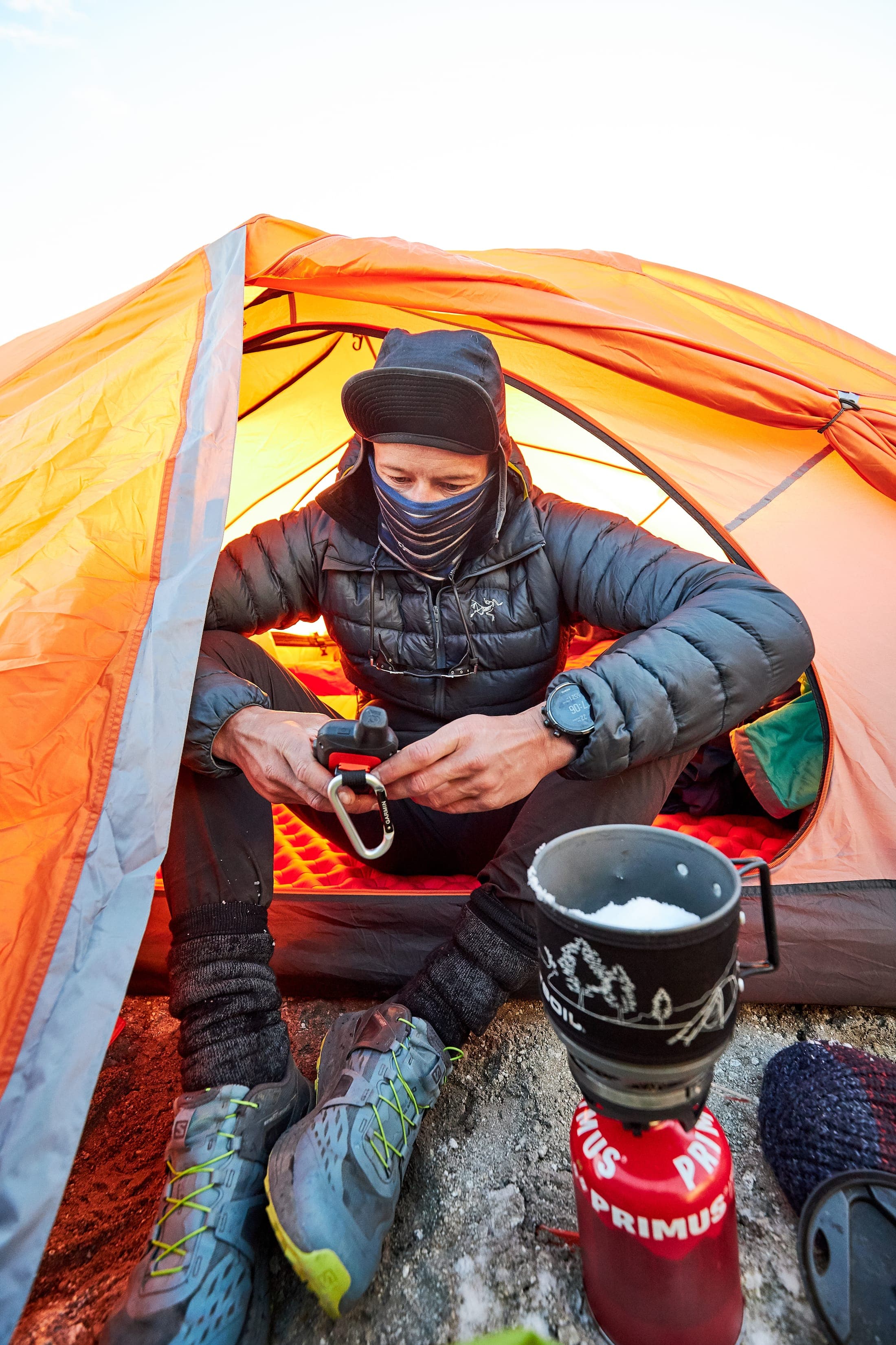 Checking weather updates at camp